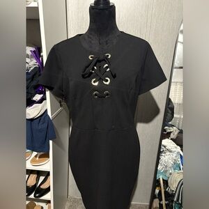 Elegant Black Dress with Lace-Up Detail